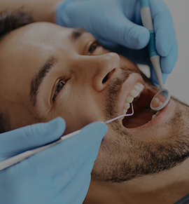 Picture of a person receiving dental services